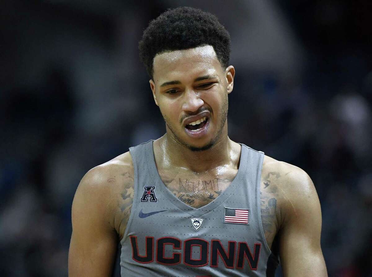 UConn’s Jalen Adams reacts as he walks off the court in the final seconds of an NCAA college basketball game against Villanova, Saturday, Jan. 20, 2018, in Hartford, Conn. (AP Photo/Jessica Hill)