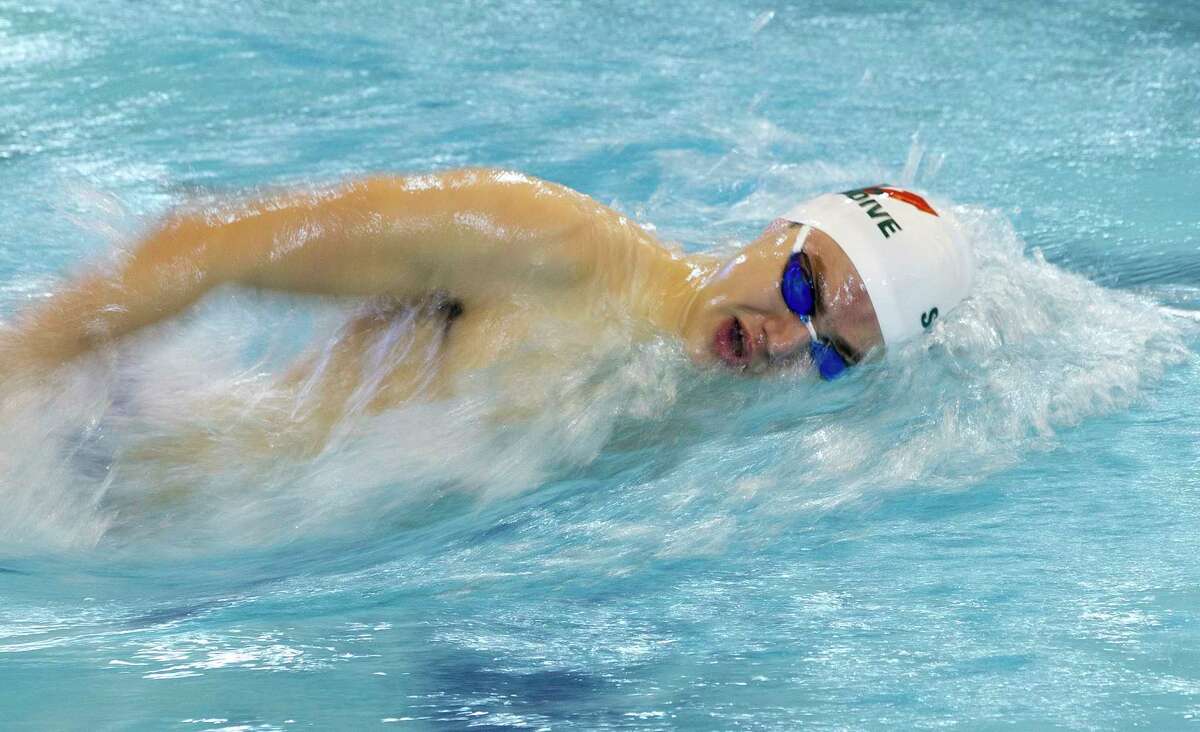 SWIMMING The Woodlands sweeps team titles at 136A meet