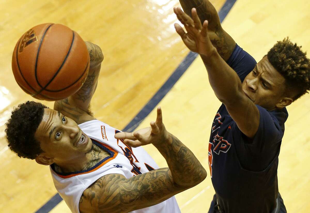 UTSA guard Deon Lyle (1) grabs for control of the ball against UTEP guard Evan Gilyard (3) during second half action Saturday Jan. 20, 2018 at the UTSA Convocation Center. UTSA won 65-61.