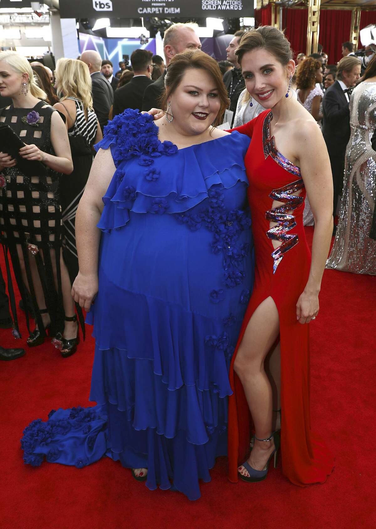 Chrissy Metz, left, and Alison Brie arrive at the 24th annual Screen Actors Guild Awards at the Shrine Auditorium & Expo Hall on Sunday, Jan. 21, 2018, in Los Angeles. (Photo by Matt Sayles/Invision/AP)