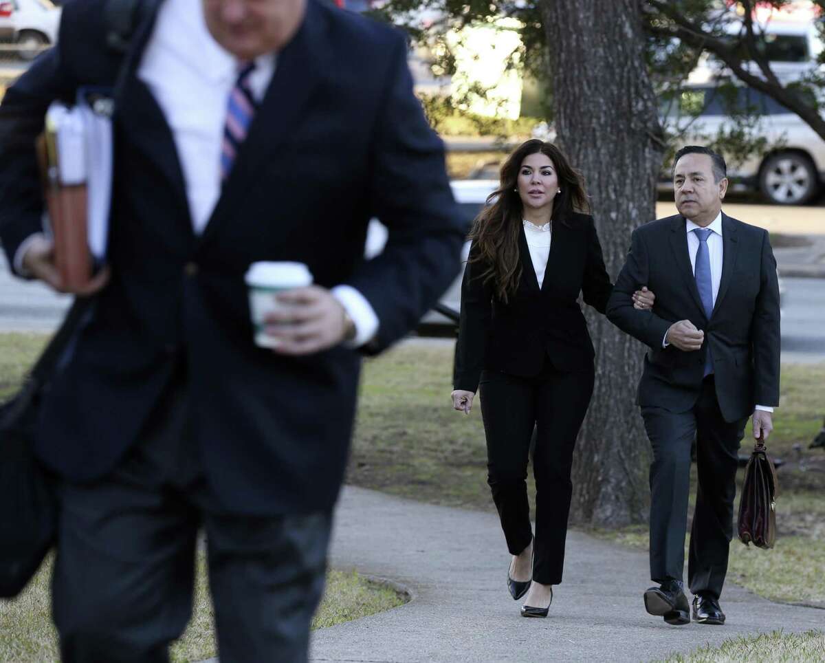 Texas State Sen. Carlos Uresti arrives for the start of his criminal trail court with his wife, Lleanna, at the John H. Wood Jr. Federal Courthouse, Monday, Jan. 22, 2018. The San Antonio Democrat and co-defendant Gary Cain face various fraud charges in connection with their roles at FourWinds Logistics, which bought and sold sand used in fracking to extract oil and gas from shale rock.