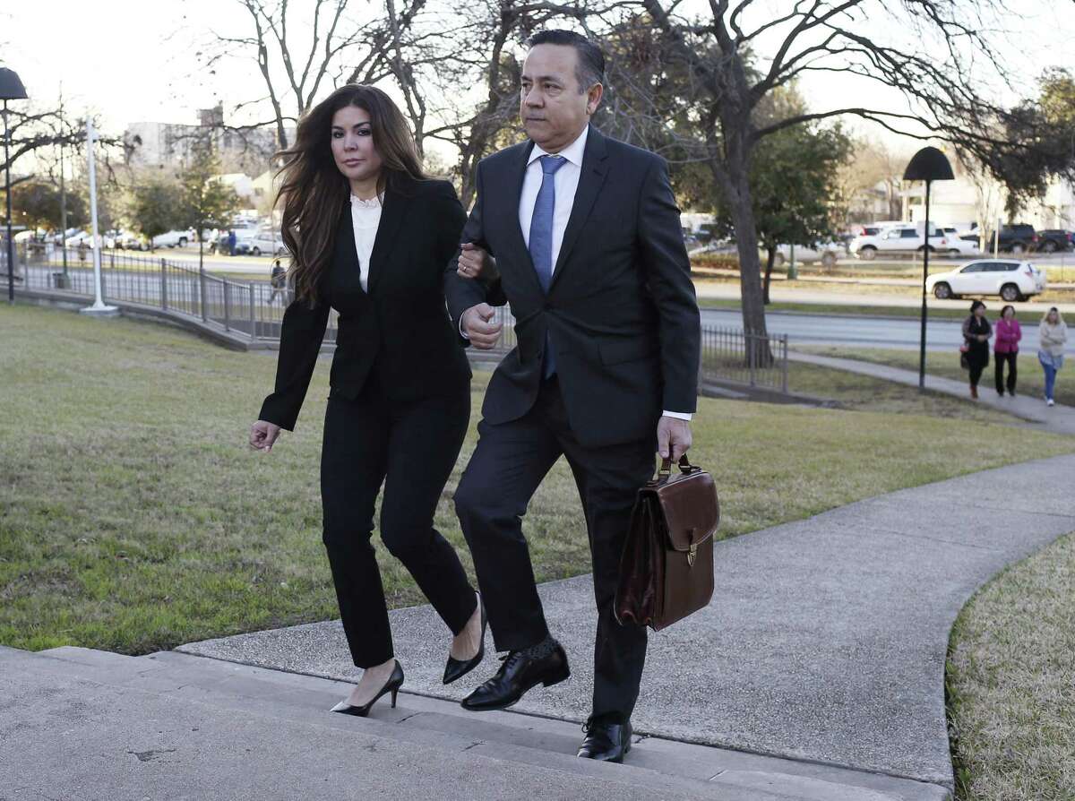 Texas State Sen. Carlos Uresti arrives for the start of his criminal trail court with his wife, Lleanna, at the John H. Wood Jr. Federal Courthouse, Monday, Jan. 22, 2018. The San Antonio Democrat and co-defendant Gary Cain face various fraud charges in connection with their roles at FourWinds Logistics, which bought and sold sand used in fracking to extract oil and gas from shale rock.