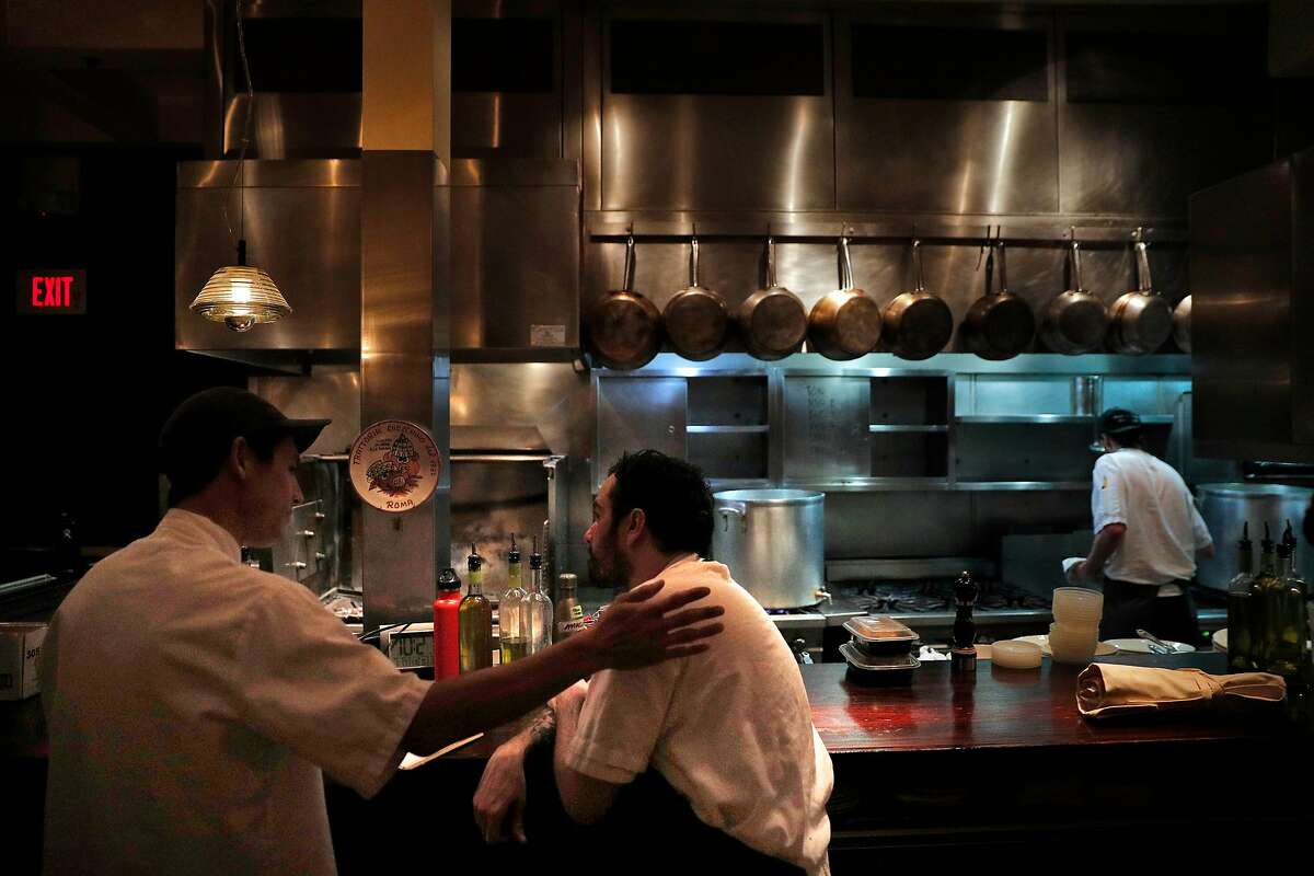 Sous Chefs Bryan Hu, left, and Marco Inclan, right, go over the evenings work after the dinner shift at Locanda in San Francisco, Calif., on Wednesday, January 17, 2018.