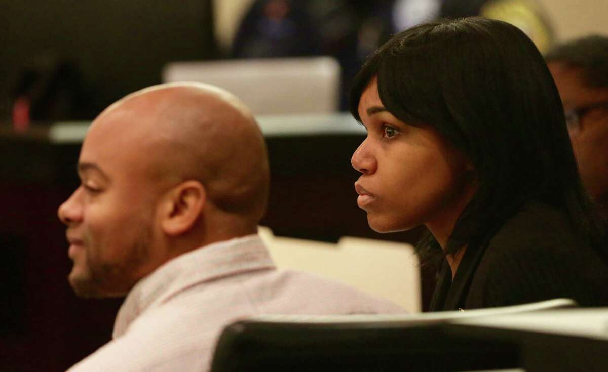 Alphonso McCloud, left, and his wife, Stanyelle McCloud, accused of serious bodily injury after their pit bull Bully last year attacked Doris Mixon Smith and pulled off her arm just below the elbow and mangled her face, sit in the 187th state District Court, presided by Judge Joey Contreras in the Cadena-Reeves Justice Center, on Monday, Jan. 22, 2018.