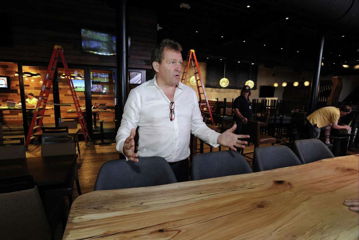 Ted Taylor, President of Sportech Venues, at the new Bobby V's, a sports bar, restaurant, and OTB lounge in Stamford. He said Sportech is well suited to offer sports betting.