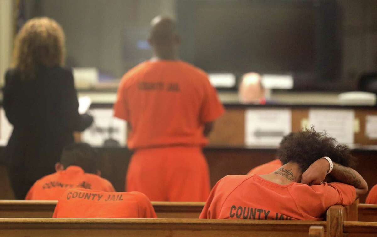 Defendants are seen during a probable cause hearing Tuesday, Dec. 19, 2017, in Houston.