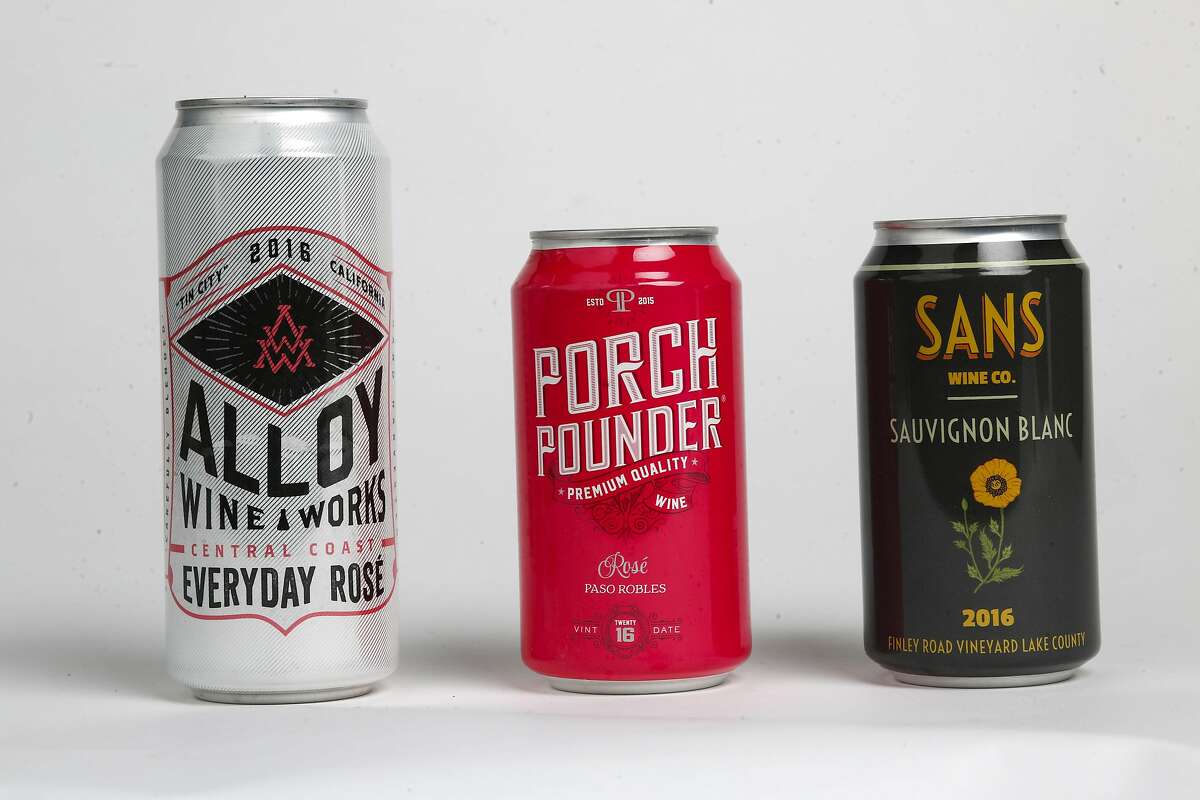Wines in a can, as seen on Tuesday, Jan. 16, 2018 in San Francisco Studio, Calif. Alloy Wine Works Centra Coast Everyday Rose, Porch Pounder Wine Rose and Sans Wine Co. Sauvignon Blanc.