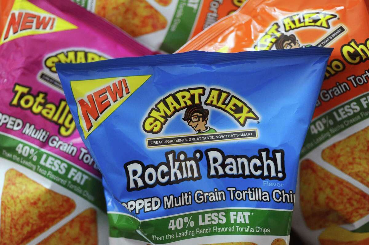Stamford residents Bruce and Maria Miller are the creators of popped tortilla chip brand Smart Alex Foods and have released three flavors, including Mucho Nacho Cheese, Totally Taco and Rockin' Ranch. Photographed inside the couple’s north Stamford, Conn. home on Tuesday, Jan. 16, 2018.