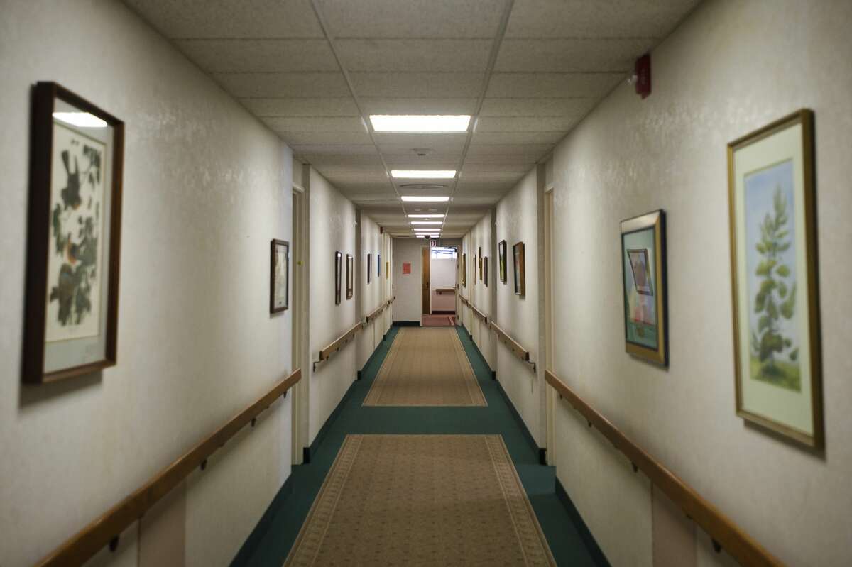 A hallway at Washington Woods is seen on Friday, Jan. 19, 2018. The independent living community has recently undergone extensive renovations after discovering asbestos. (Katy Kildee/kkildee@mdn.net)