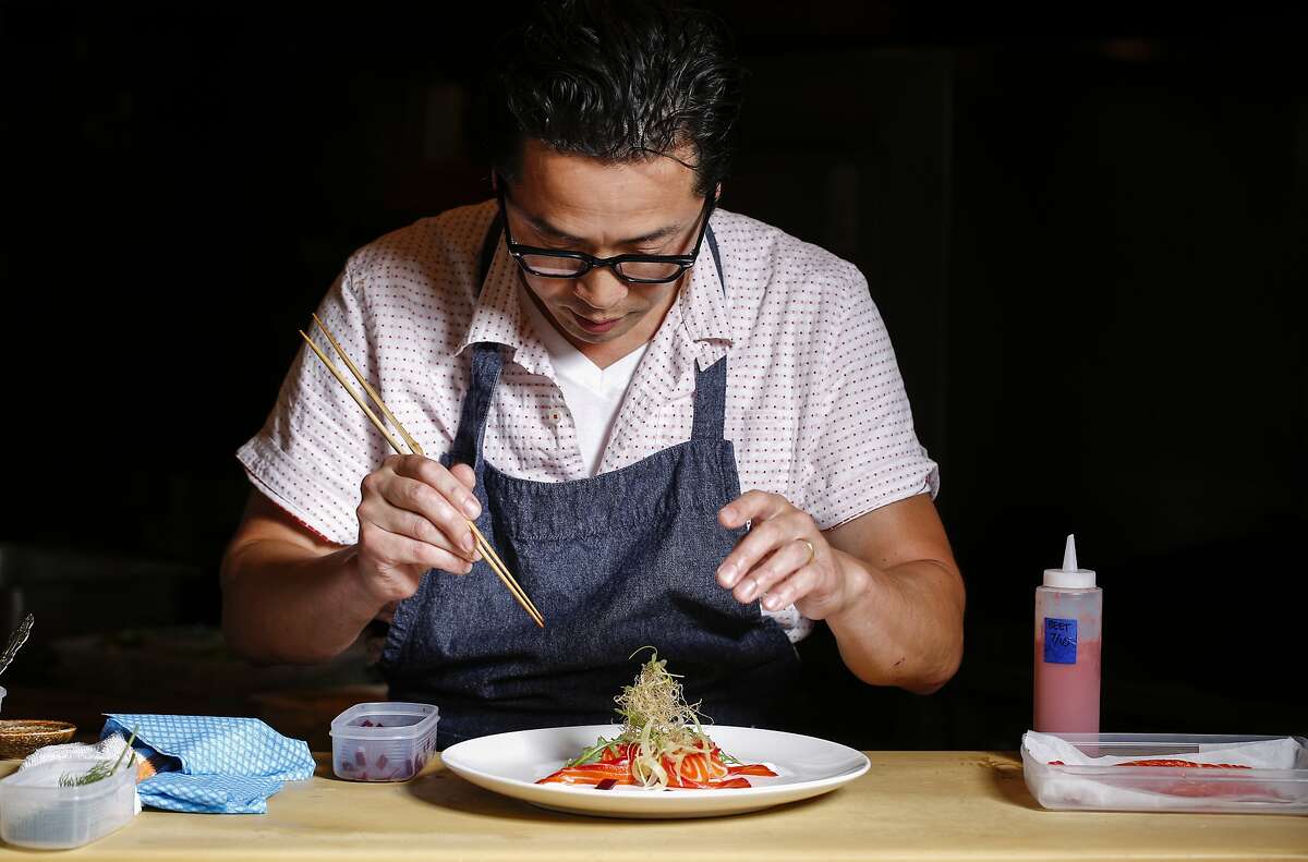 Sho Kamio of Iysasare assembles his Beet Cured Ocean Trout with Yuzu Aioli on Thursday, July 17, 2014 in Berkeley, Calif.