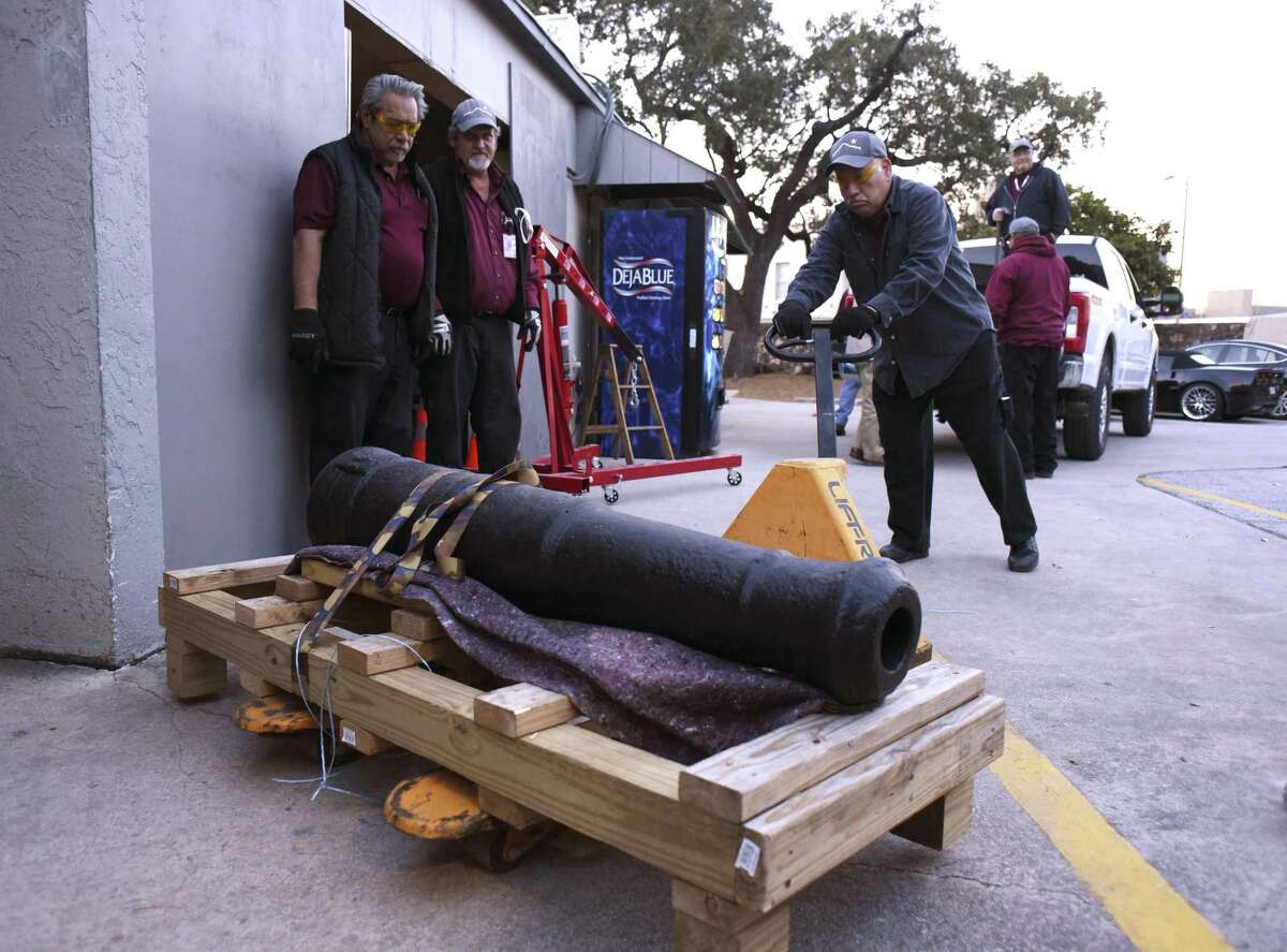 The Spanish cannon is moved into storage at the Alamo on Tuesday.