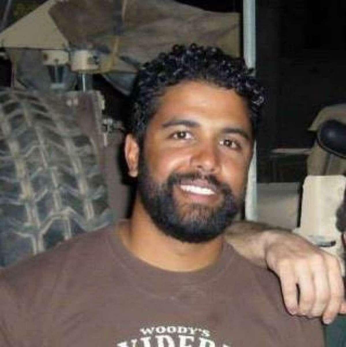Richard Concepcion, 37, was in the process of retiring from the special forces, when police said he shot his estranged wife. He is pictured here on one of his many deployments to Afghanistan, according to family.