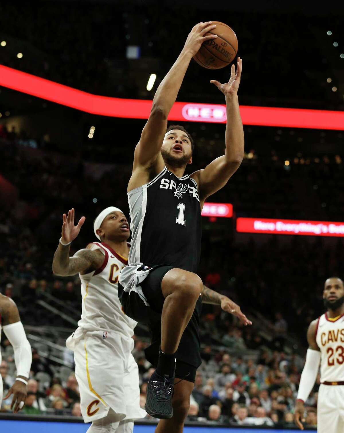 Spurs' Kyle Anderson (01) goes up for a score against Cleveland Cavaliers' Isaiah Thomas (03) at the AT&T Center on Tuesday, Jan. 23, 2018.