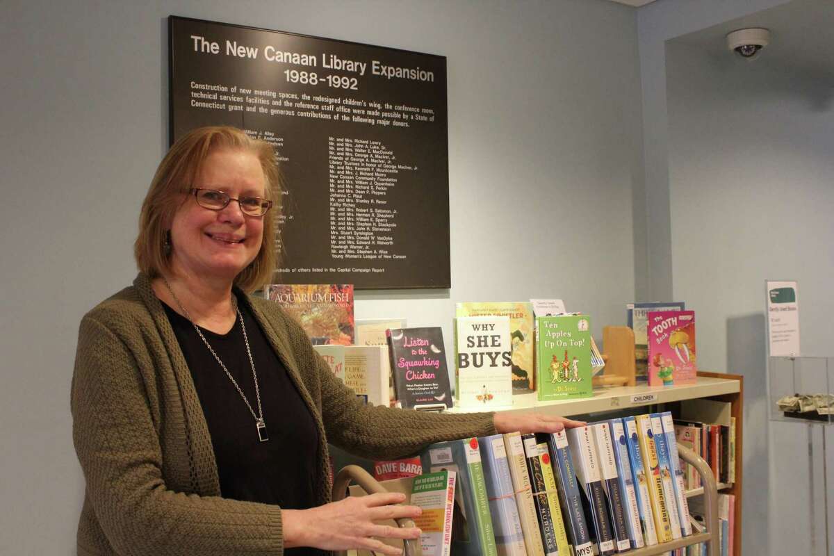 Lauren Phillips is the collection manager at the New Canaan Library where she has worked for 30 years. Photo taken on Jan. 22, 2018.