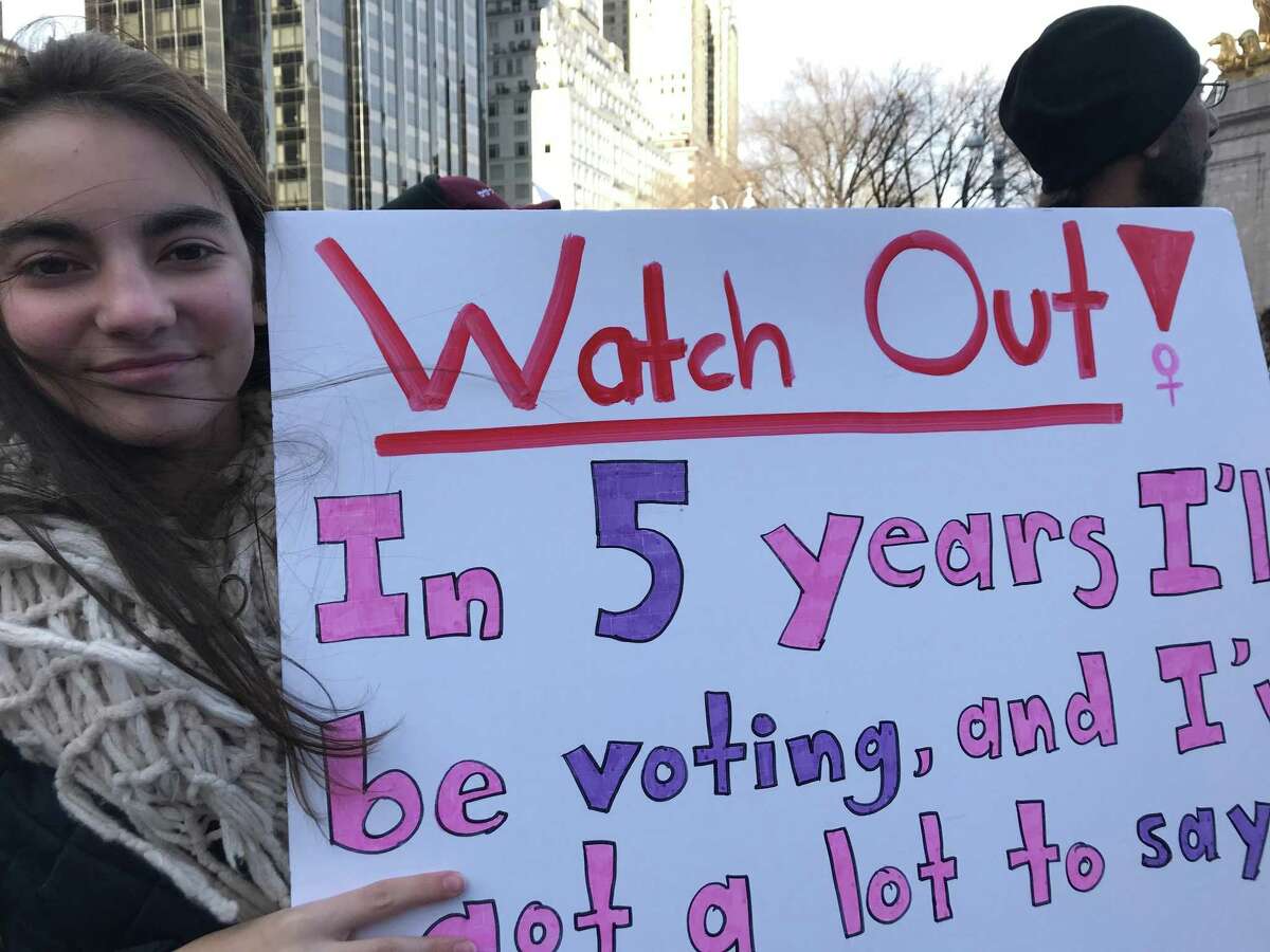 Amélie L’Hénaff, 13, of New Canaan, marched in the New York City Women's March on Saturday.