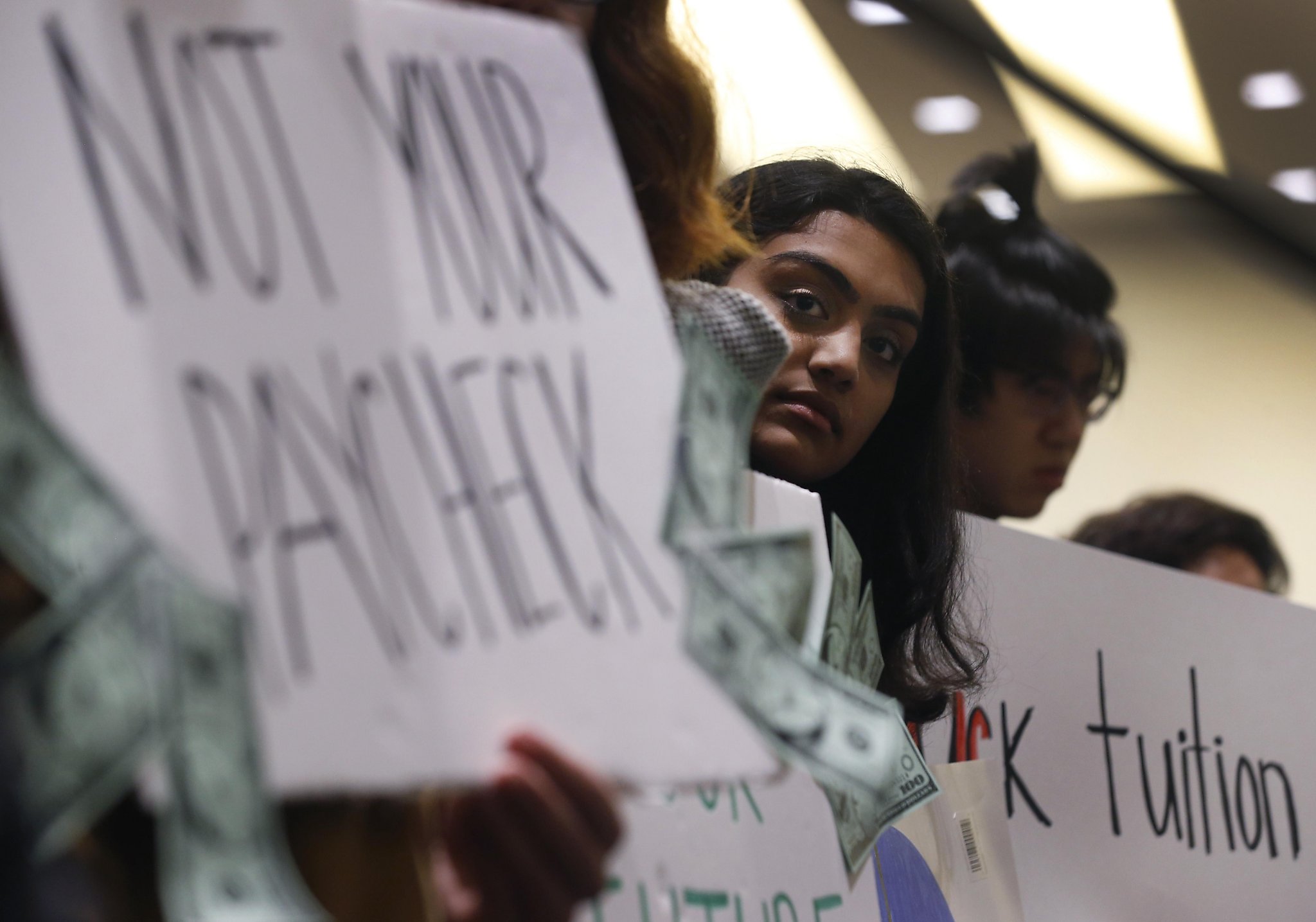 Under pressure, UC regents put vote on raising tuition on hold