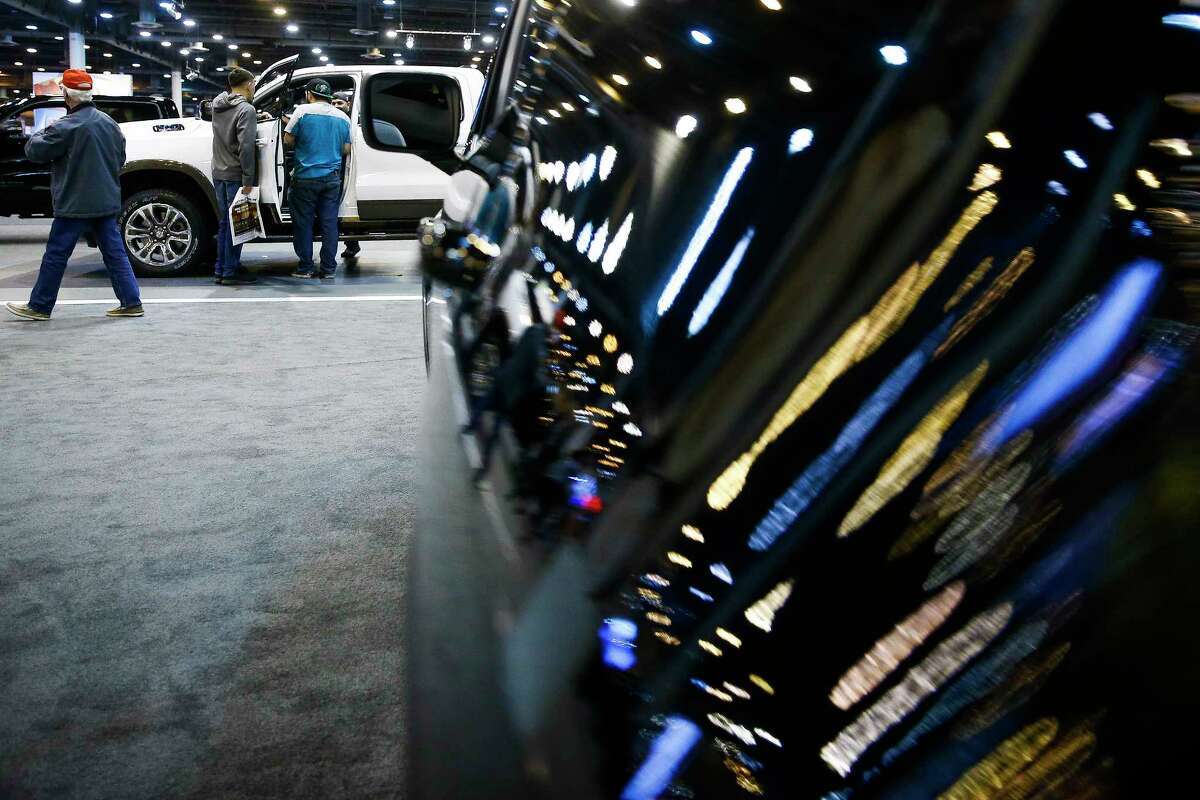 People check out the RAM 1500 Laramie Longhorn during its debut at the Houston Auto Show at NRG Center Wednesday, Jan. 24, 2018 in Houston. ( Michael Ciaglo / Houston Chronicle)