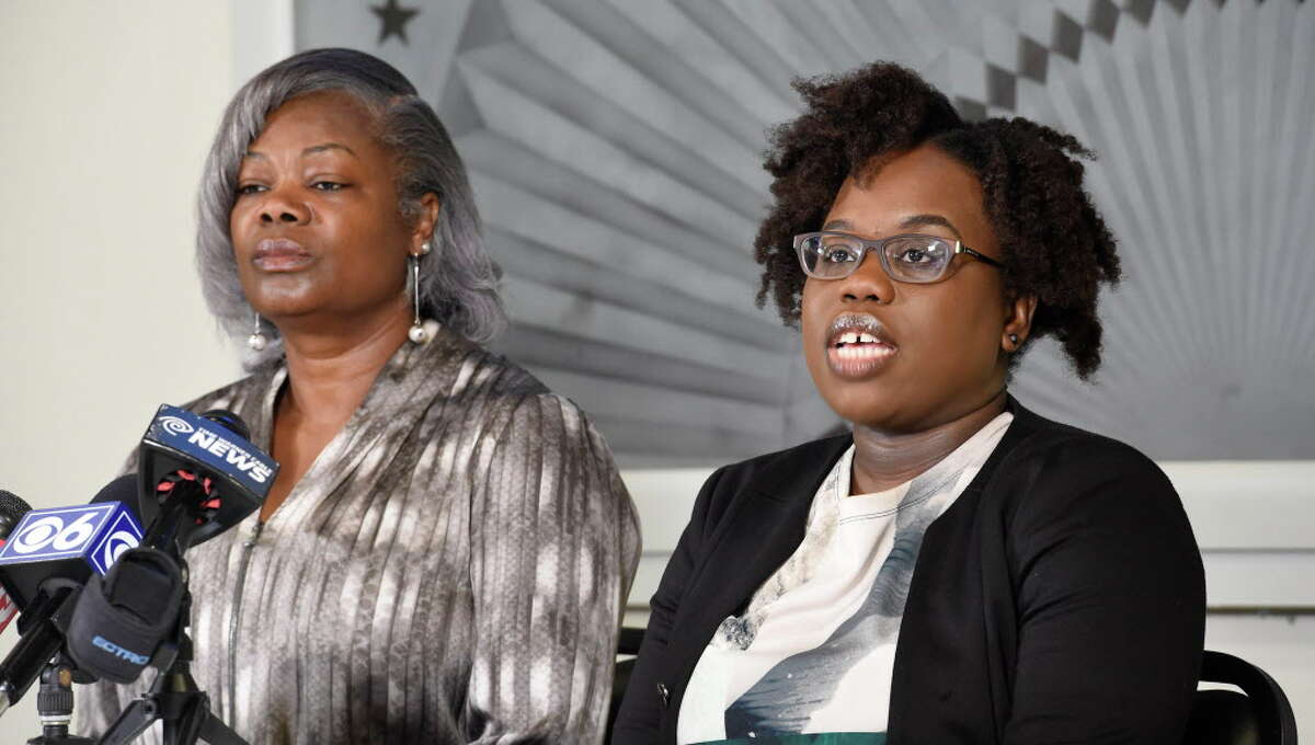 Gertha DePas, mother of Edson Thevenin who was shot by Troy Police Sgt. French, left is joined by her daughter in law Cinthia Thevenin as they spoke to the media during a press conference April 28, 2016 at the Empire Christian Center in Albany, N.Y. (Skip Dickstein/Times Union)