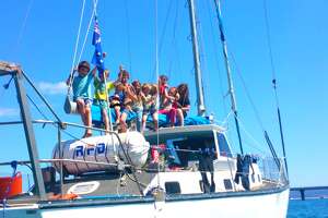 Photos: Family of 13 sold it all to live on this boat - Photo