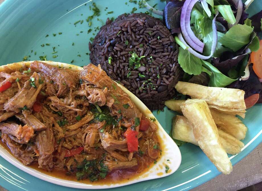 Review Congas Restaurant dishes respectable Caribbean fare San