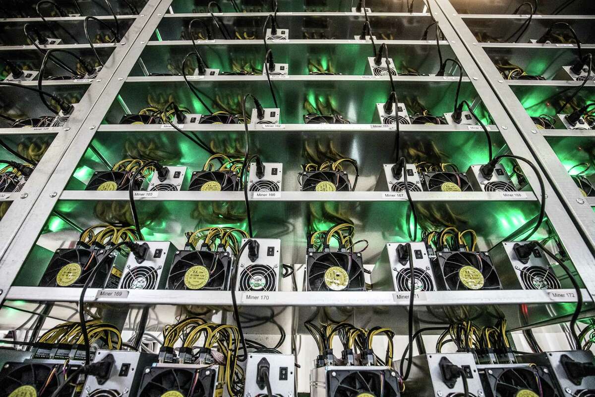 Cryptocurrency mining rigs are shown here. Texas securities regulators have issued an emergency cease-and-desist order against Hong-Kong based company R2B Coin. The company is “selling investments tied to a cryptocurrency called r2b coin, promising investors that the digital currency will soon be one of the world’s most valuable,” according to the Texas State Securities Board.