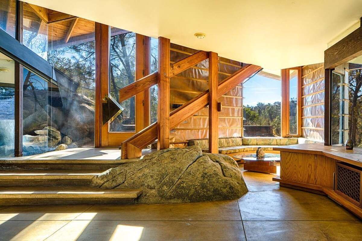 Yosemitearea house built into the granite boulders listed for 590,000