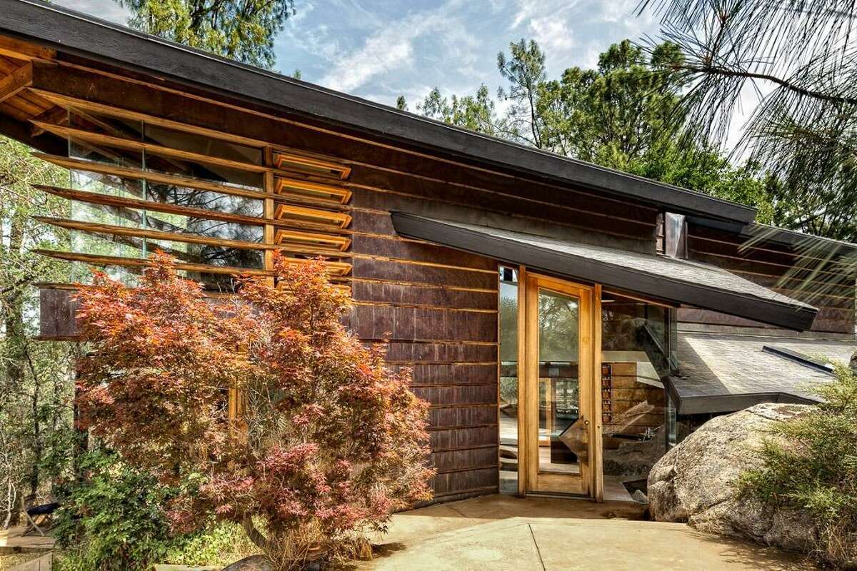 Yosemitearea house built into the granite boulders listed for 590,000