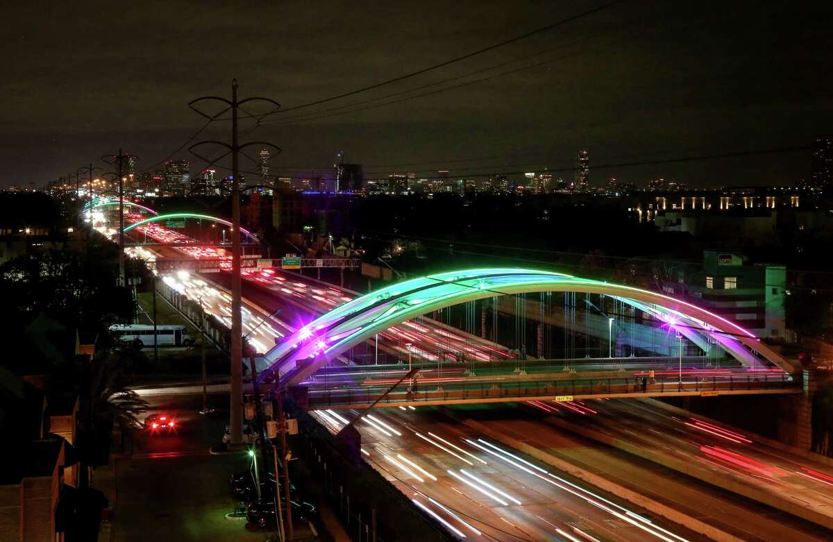 A series of bridges over Highway 59, in the Montrose area, are illuminated for the upcoming Super Bowl, Thursday, Feb. 2, 2017, in Houston. ( Jon Shapley / Houston Chronicle )