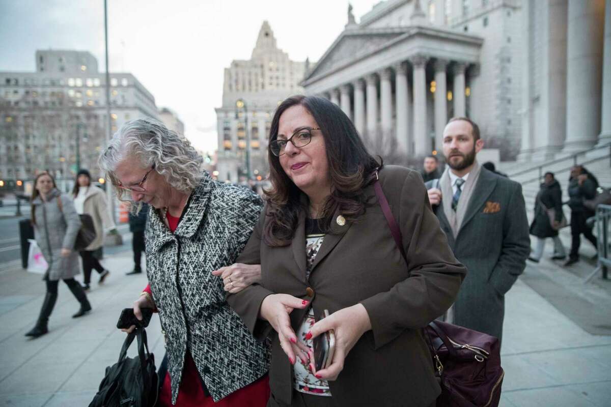 Linda Lacewell, right, chief of staff to New York Gov. Andrew Cuomo, leaves a Manhattan federal courthouse, Wednesday, Jan. 24, 2018, in New York. Lacewell testified Wednesday at Joseph Percoco's bribery trial. Opening statements were Tuesday at the trial of Percoco and three businessmen accused of paying him over $300,000 in bribes to help them get what they needed from the state. (AP Photo/Mary Altaffer)