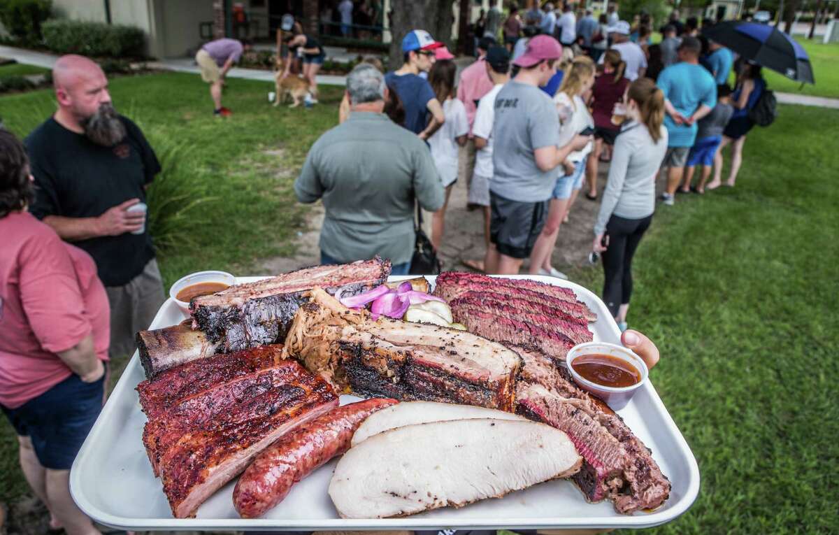 A platter of smoked meats at Killen's Barbecue exemplifies the visual appeal of barbecue.