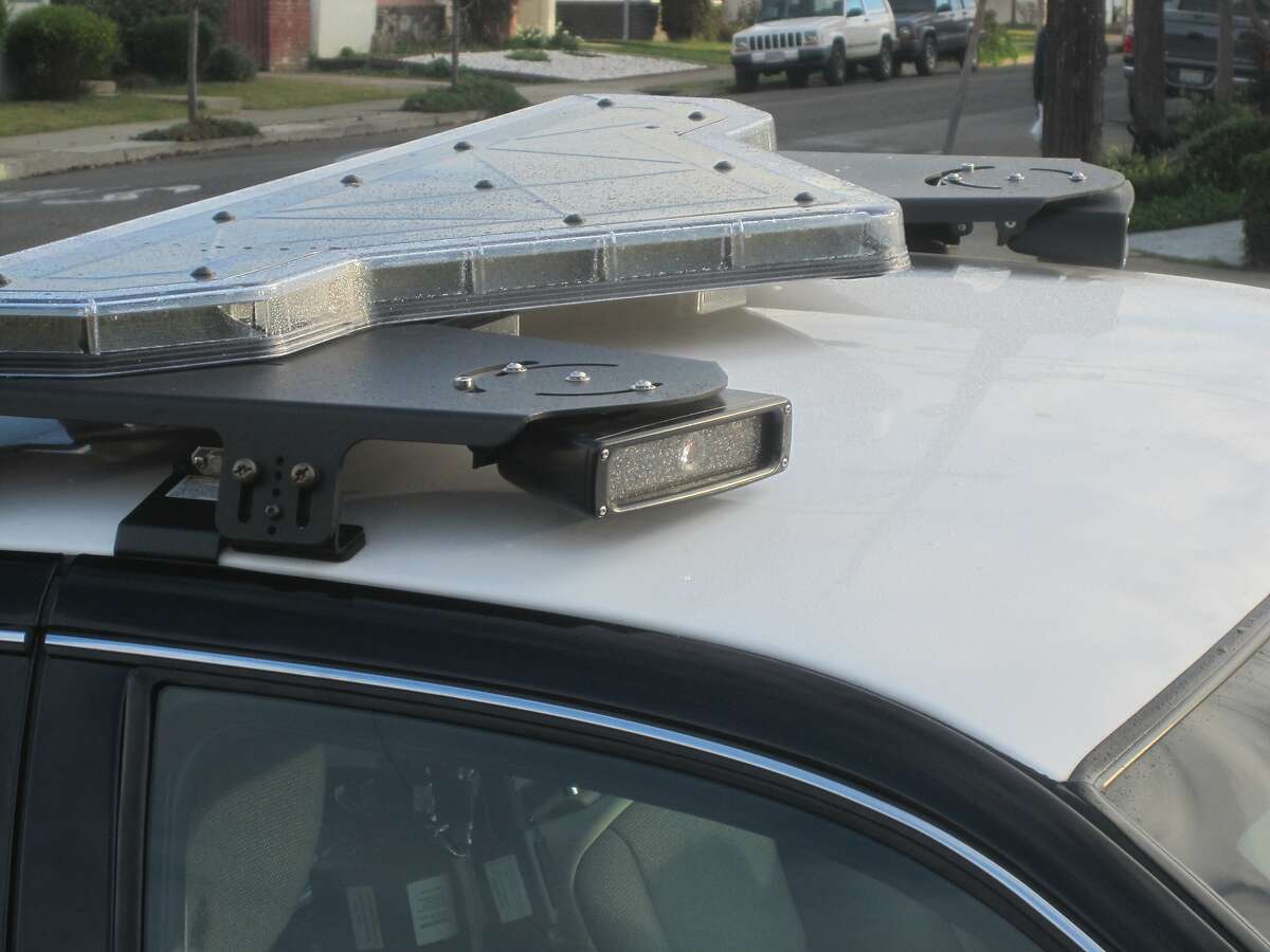 Examples of a license-reader attached to a San Leandro Police Department patrol car.