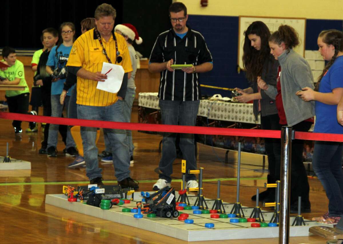 Middle schoolers converged Friday evening at the Bad Axe Middle School for a robotics competition.