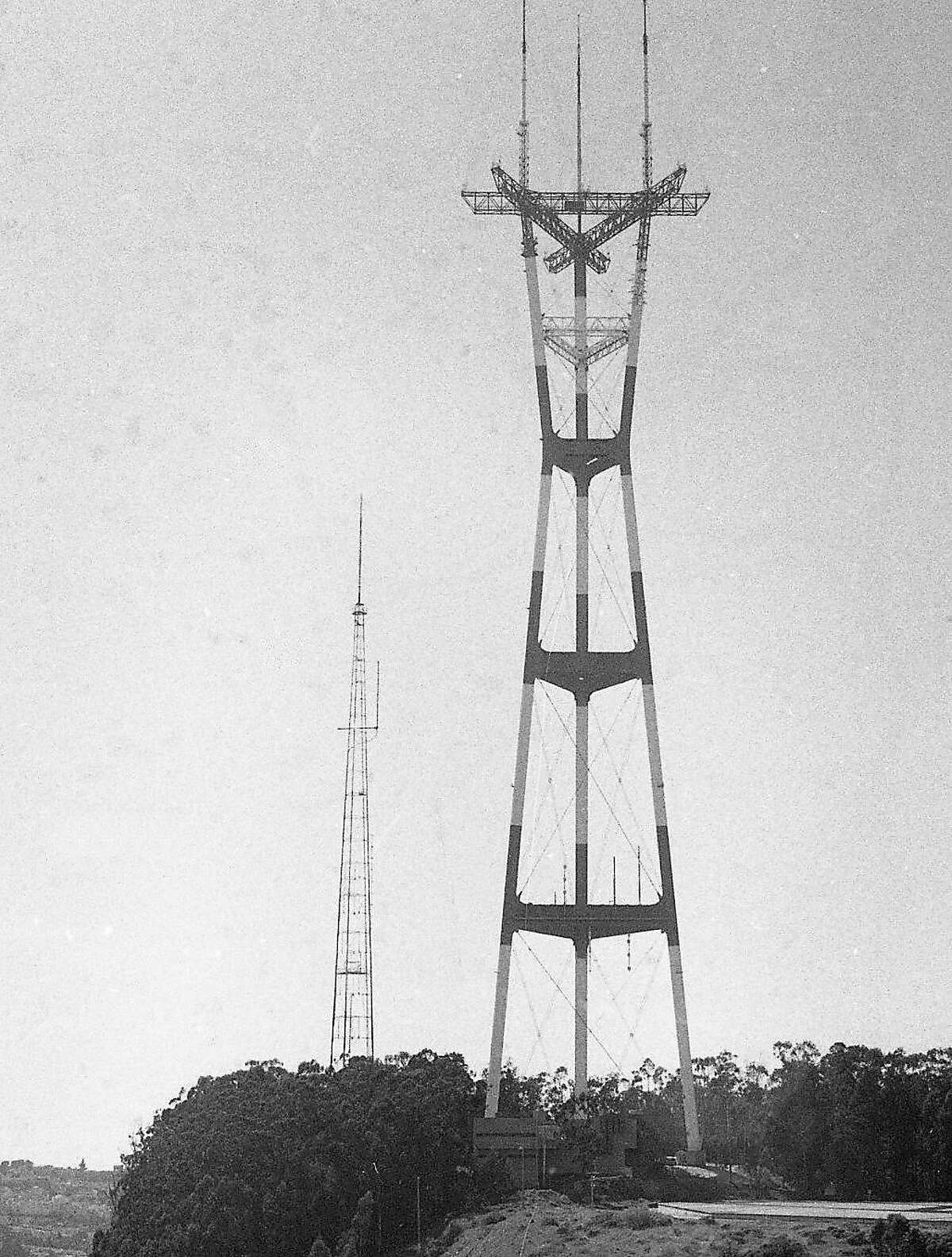 the new Sutro Tower next to the first one and Sutro Mansion April 10, 1974