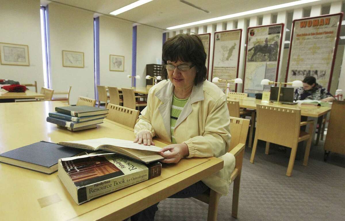 New Braunfels resident Joy Asbury scours a census archive as part of her occupation to find out about her ancestry at the San Antonio Public Library Texana and Genealogy Department in 2014. Asbury, a member of the Daughters of the American Revolution, said the department is a great resource for her.