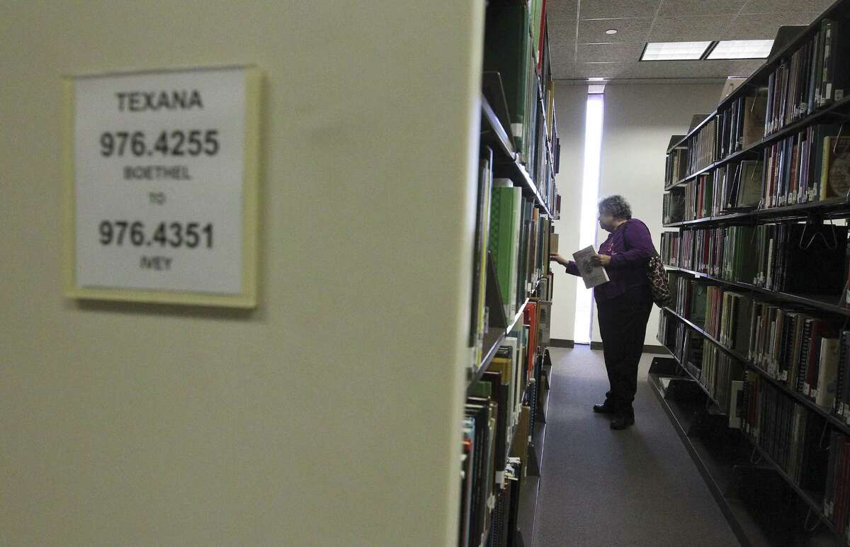 In 2014, Mary Esther Zahradnick searches the Texana and Genealogy Department of the San Antonio Public Library for information.  Zahradnick, a member of the Hispanic genealogy group Los BexareÃ±os, used the department to trace her ancestors back to 1741.