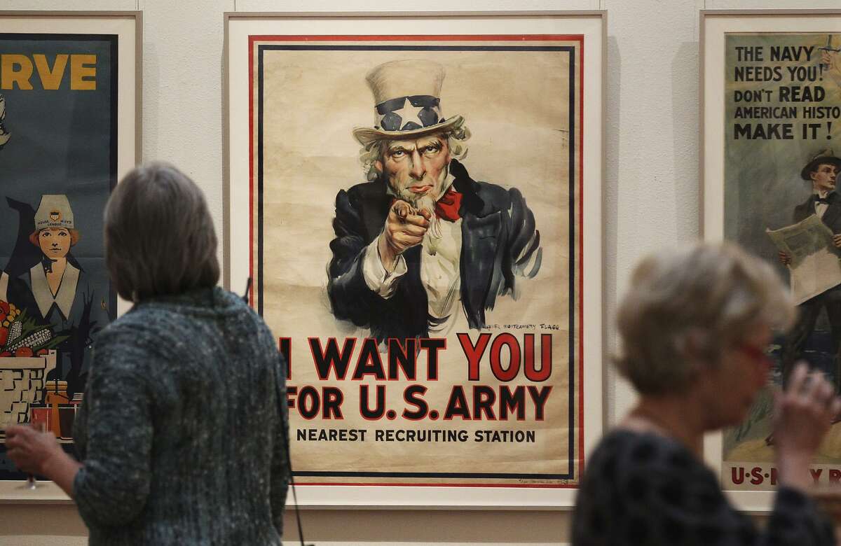 The familiar iconic image of "Uncle Sam" by illustrator James Montgomery Flagg is seen on display along with other vintage World War I posters at the Central Library Gallery on Oct. 8, 2013. The library opened an exhibit of 40 vintage World War I posters from illustrators commissioned by the U.S. Committee on Public Information to "build patriotism, raise funds for war bonds, encourage enlistment and increase volunteerism." The posters were bequeathed to the library in 1940 by Harry Hertzberg, former Texas state senator.