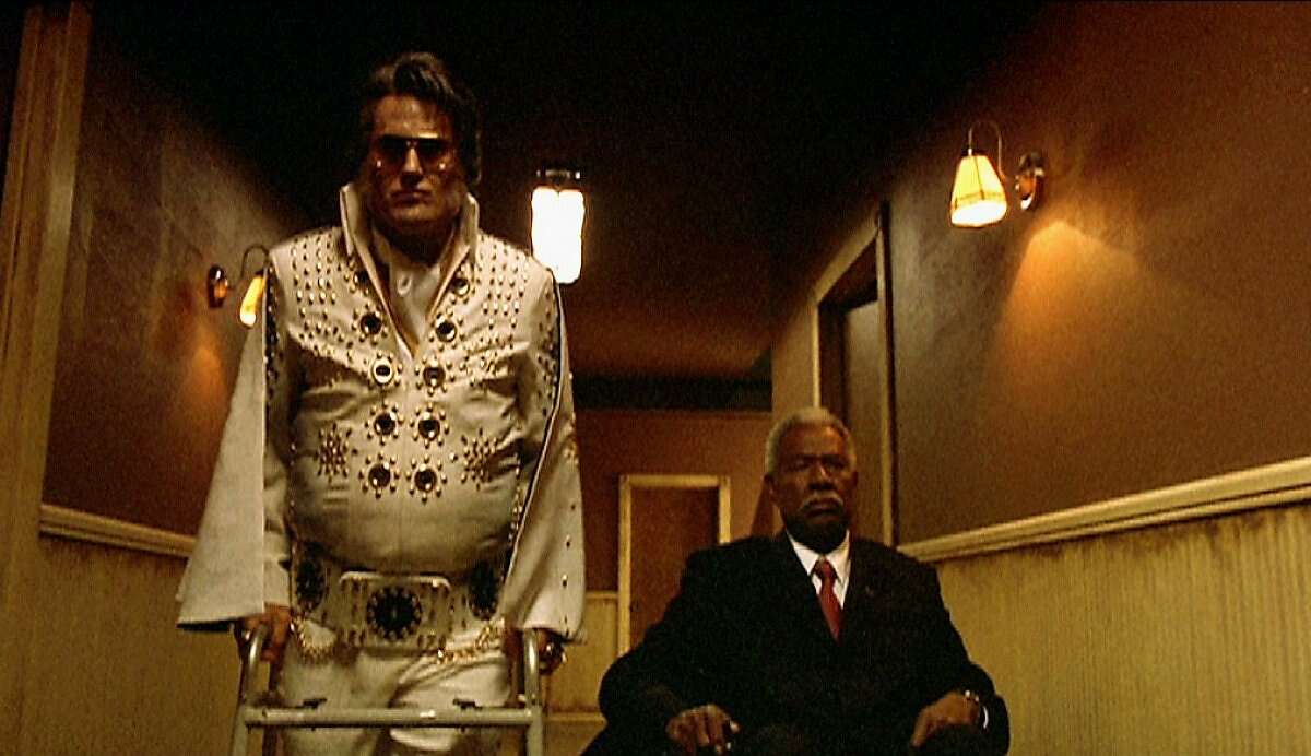 Bruce Campbell as Elvis Presley and Ossie Davis as John F. Kennedy in Don Coscarelli's "Bubba Ho-Tep" (2002).