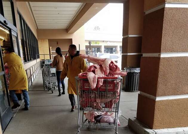 Report: Employees fired after photos of unwrapped meat being transported in shopping carts go viral