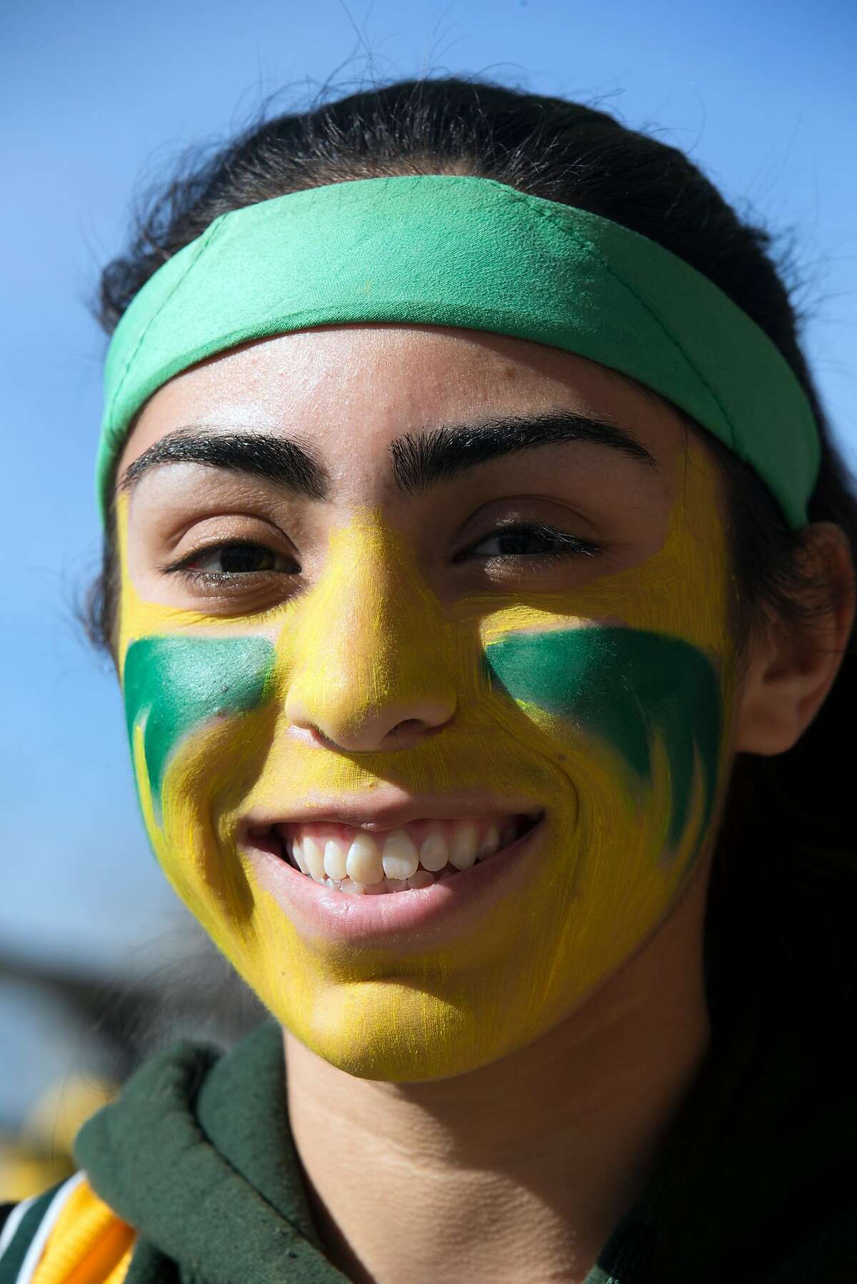 A's fan Meah Martinez of Fremont, Calif. shows her team colors during Oakland Athletics Fan Fest at Jack London Square on Saturday, Jan. 27, 2018 in Oakland, Calif.