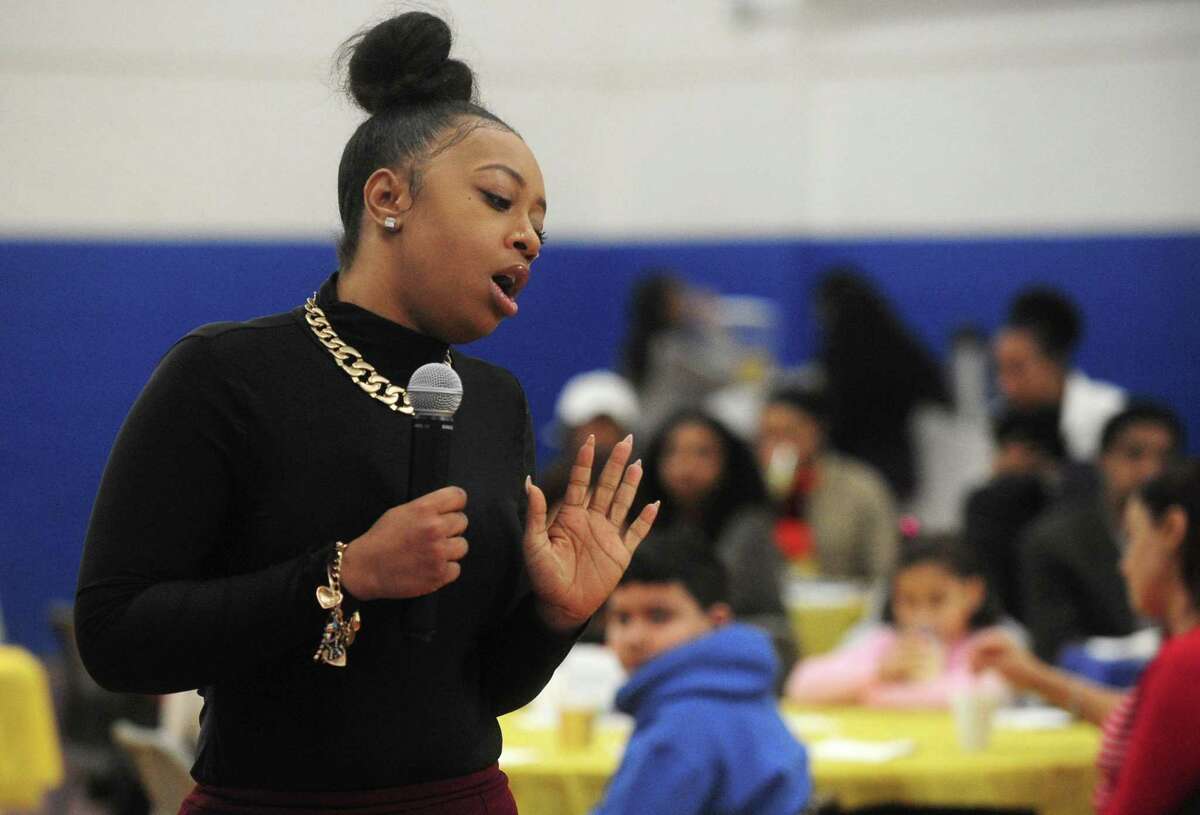 Carver alumni Andreya Lovelace talks with young people about her career as a business owner during the Carver Center Breakfast with Champions event Saturday, January 27, 2018, in Norwalk, Conn. The George Washington Carver Center will celebrates its 80 anniversary this week.
