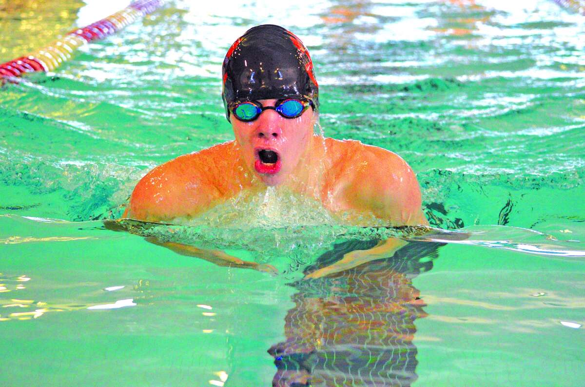 Edwardsville sophomore Logan Mills swims in the 200-yard individual medley during Saturday’s five-team meet at Eisenhower Pool in Springfield.