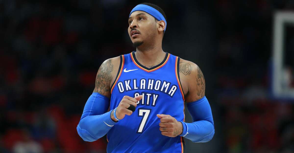 Oklahoma City Thunder forward Carmelo Anthony runs up court during the second half of an NBA basketball game against the Detroit Pistons, Saturday, Jan. 27, 2018, in Detroit. (AP Photo/Carlos Osorio)