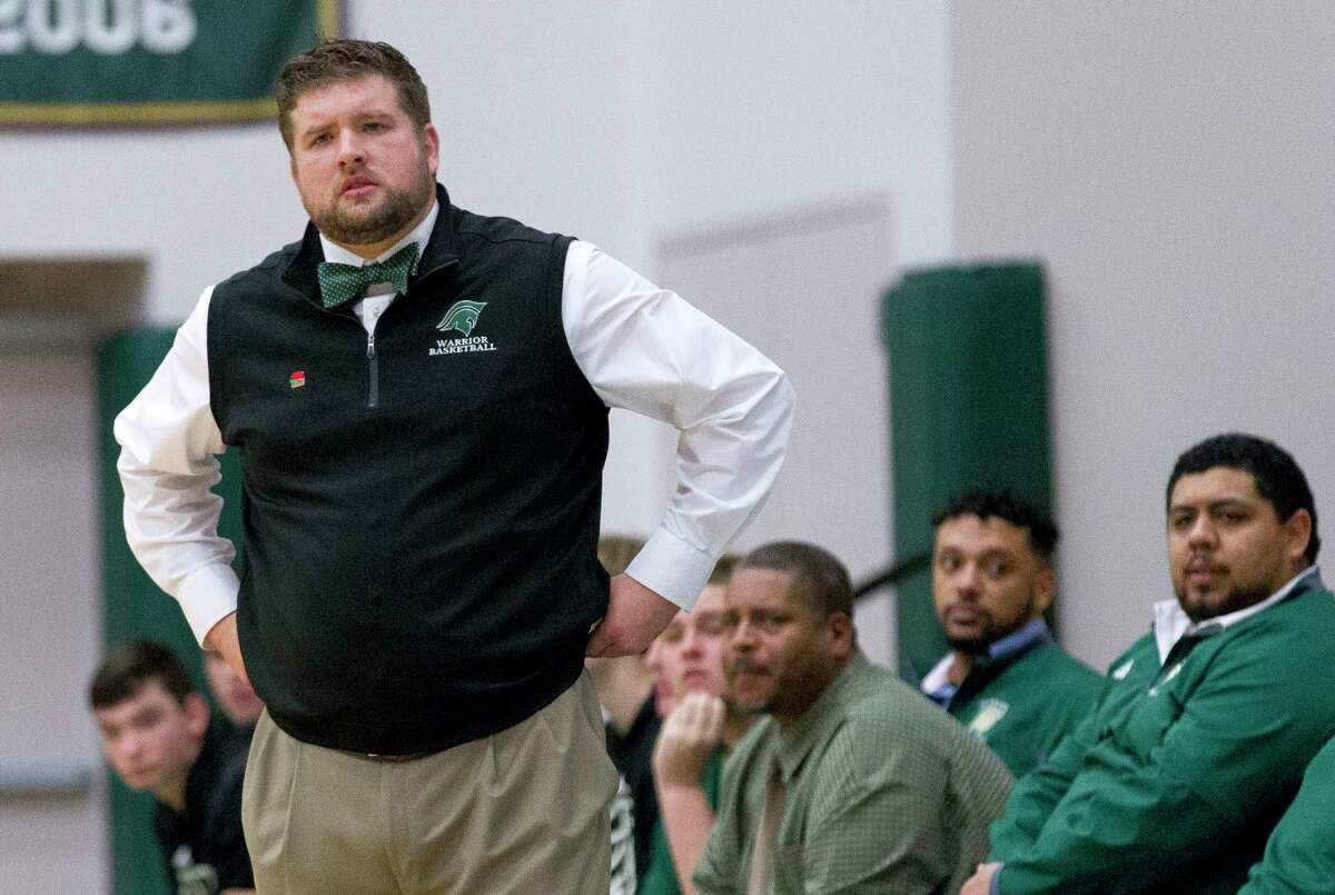 The Woodlands Christian head coach Tanner Field is seen during the first quarter of a TAPPS high school basketball game at The Woodlands Christian Academy, Saturday, Jan. 27, 2018, in The Woodlands.