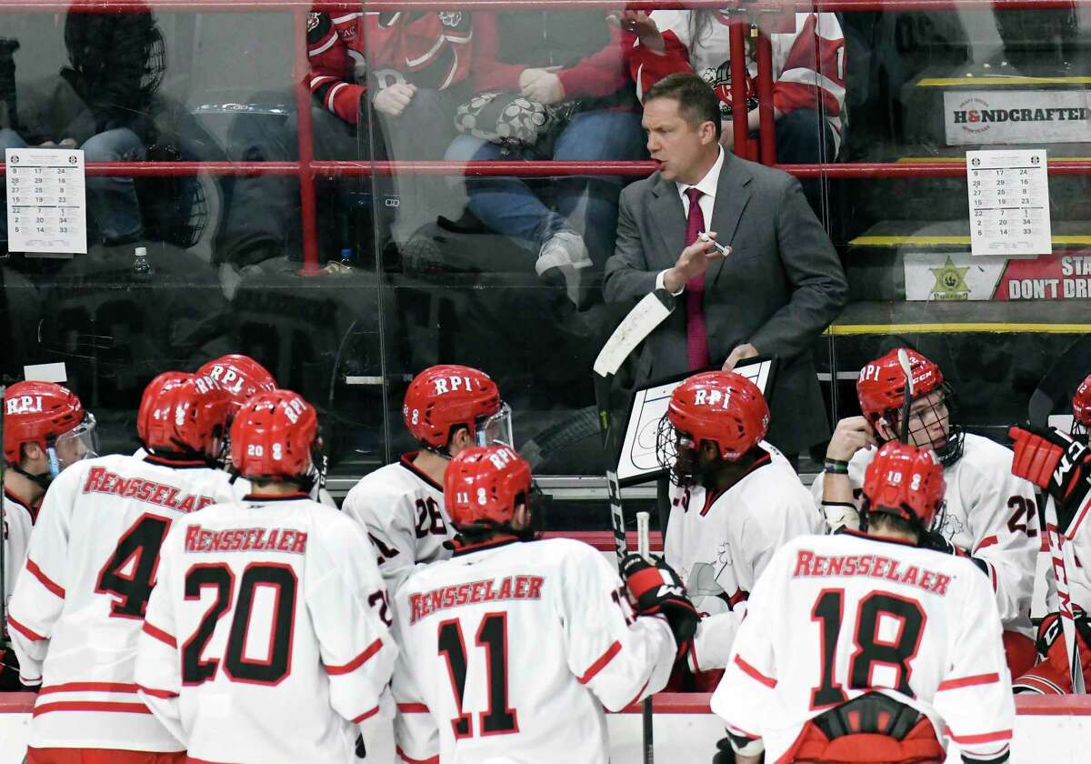 Rensselaer Polytechnic Institute head coach Dave Smith instructs his players against Union during the first period of an NCAA college hockey game Saturday, Jan. 27, 2018, in Albany, N.Y., (Hans Pennink / Special to the Times Union)