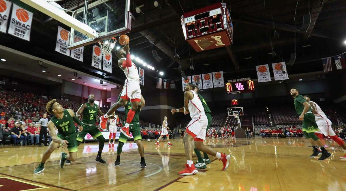 Houston Cougars guard Corey Davis Jr. (5) grabs the rebound during the first half of the American Athletic Conference game against South Florida Bulls at H&PE Arena on Sunday, Jan. 28, 2018, in Houston.