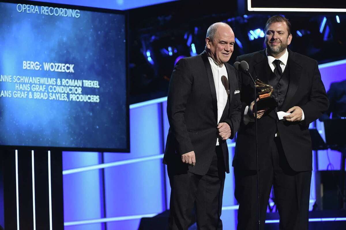Conductor Hans Graf, left, and recording engineer Brad Sayles, winners of best opera recording for "Berg: Wozzeck," accept the award onstage at the Premiere Ceremony during the 60th Annual Grammy Awards at Madison Square Garden on January 28, 2018 in New York City.