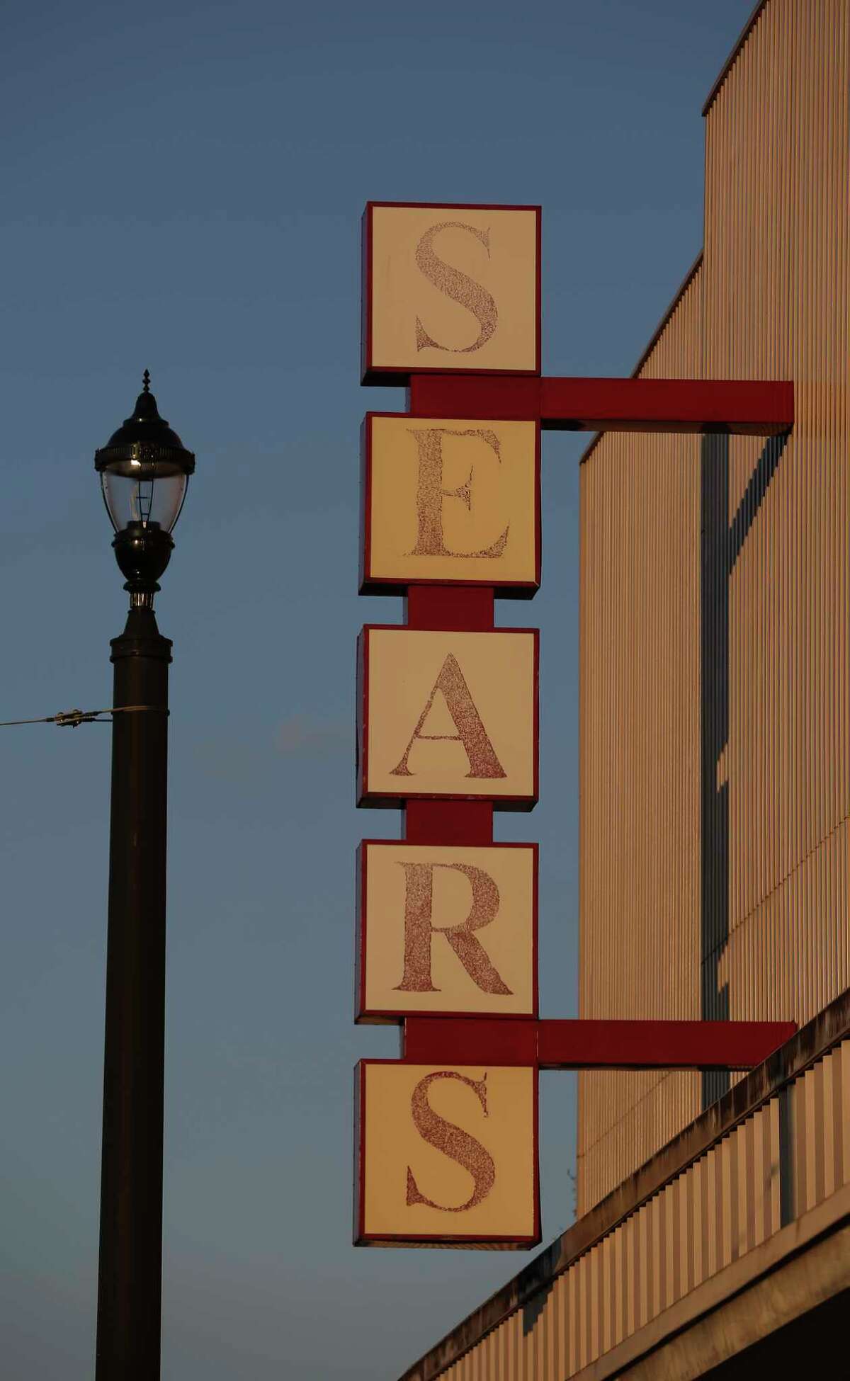 The faded SEARS sign of the Sears Main Street location is seen on Sunday, Jan. 28, 2018, in Houston. Sunday was the last open day of the department store.