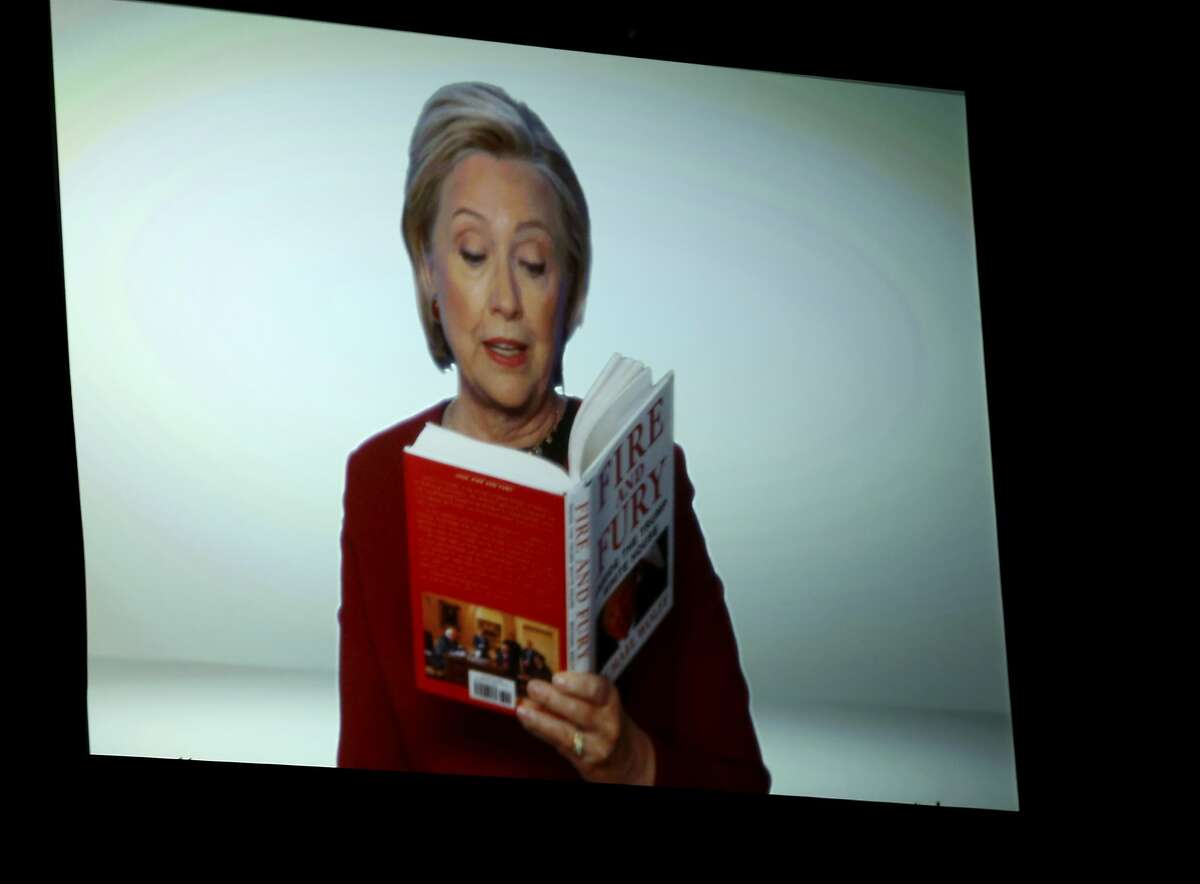 Hillary Clinton appears on screen reading an excerpt from the book "Fire and Fury" during a skit at the 60th annual Grammy Awards at Madison Square Garden on Sunday, Jan. 28, 2018, in New York. (Photo by Matt Sayles/Invision/AP)