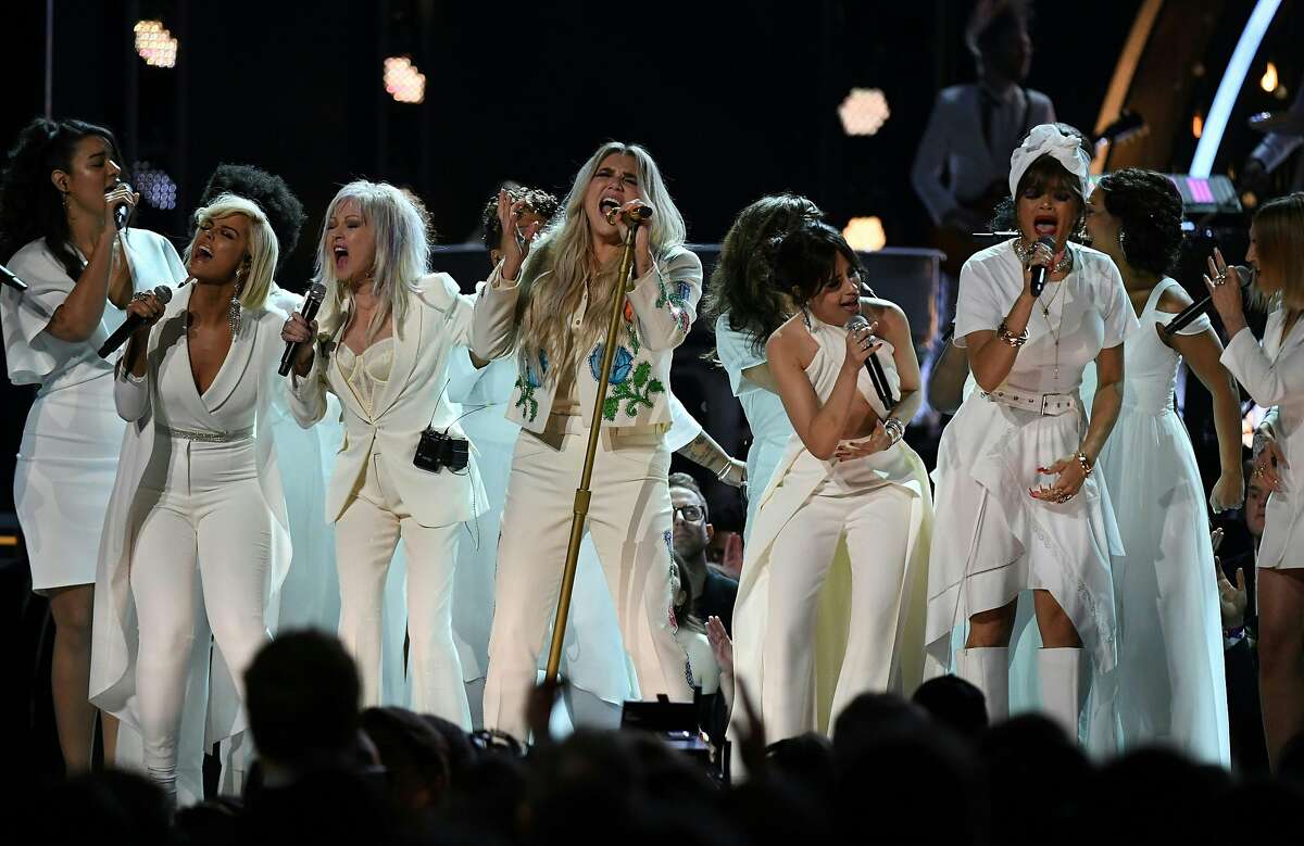 Kesha (C) performs with (from L to R) Bebe Rexha, Cindy Lauper, Camila Cabello and Andra Day during the 60th Annual Grammy Awards show on January 28, 2018, in New York. / AFP PHOTO / Timothy A. CLARYTIMOTHY A. CLARY/AFP/Getty Images