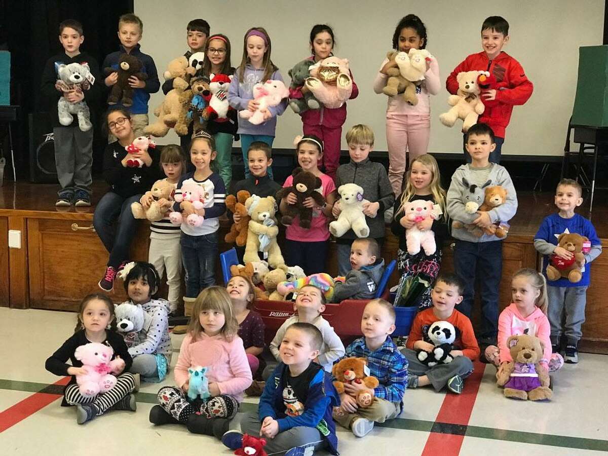 Pre-K to second-grade students at Edna C. Stevens School in Cromwell collected 200 Teddy bears to be sent to a California school district whose families were affected by the recent fires.